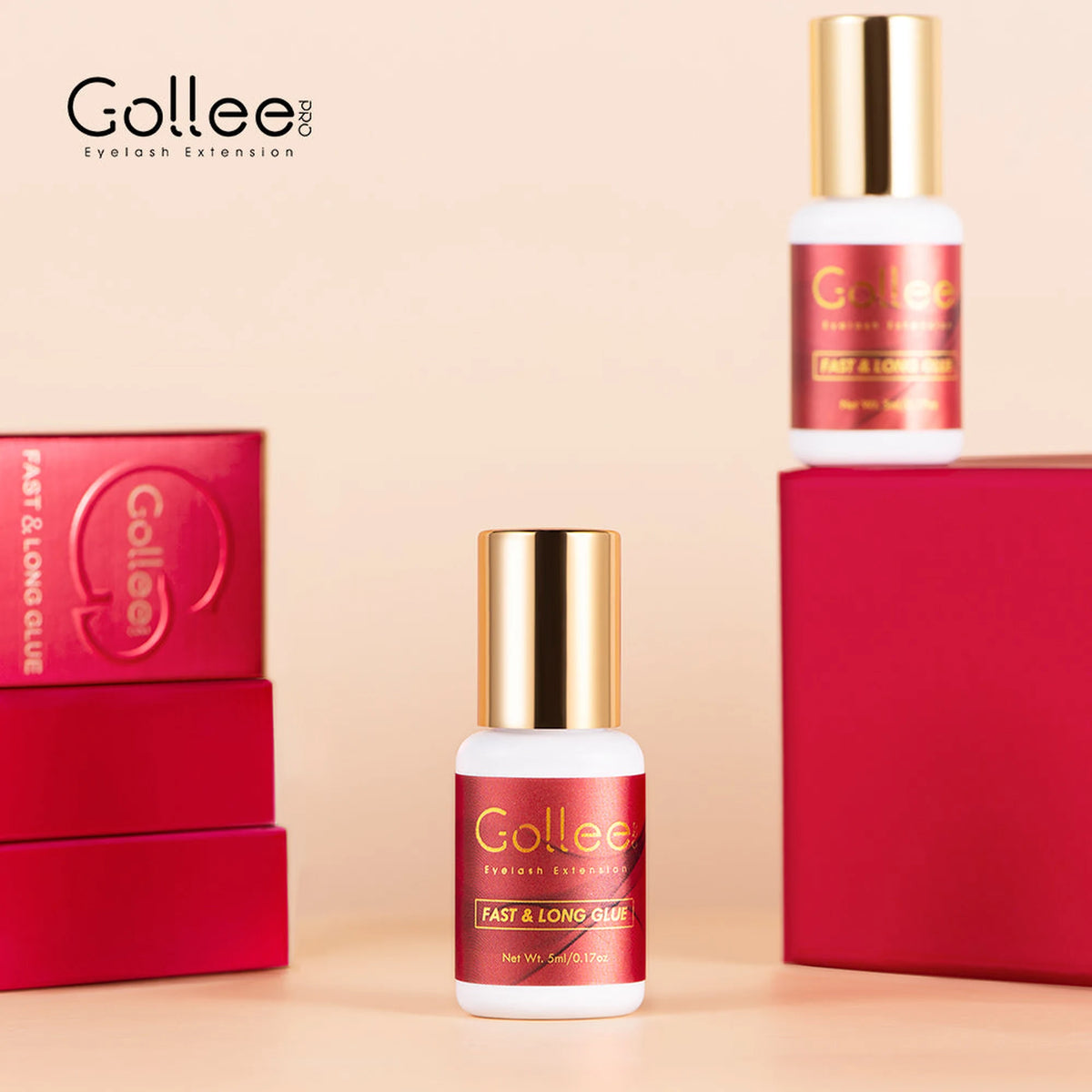 Dos frascos de adhesivo Gollee Rojo sobre cajas rojas